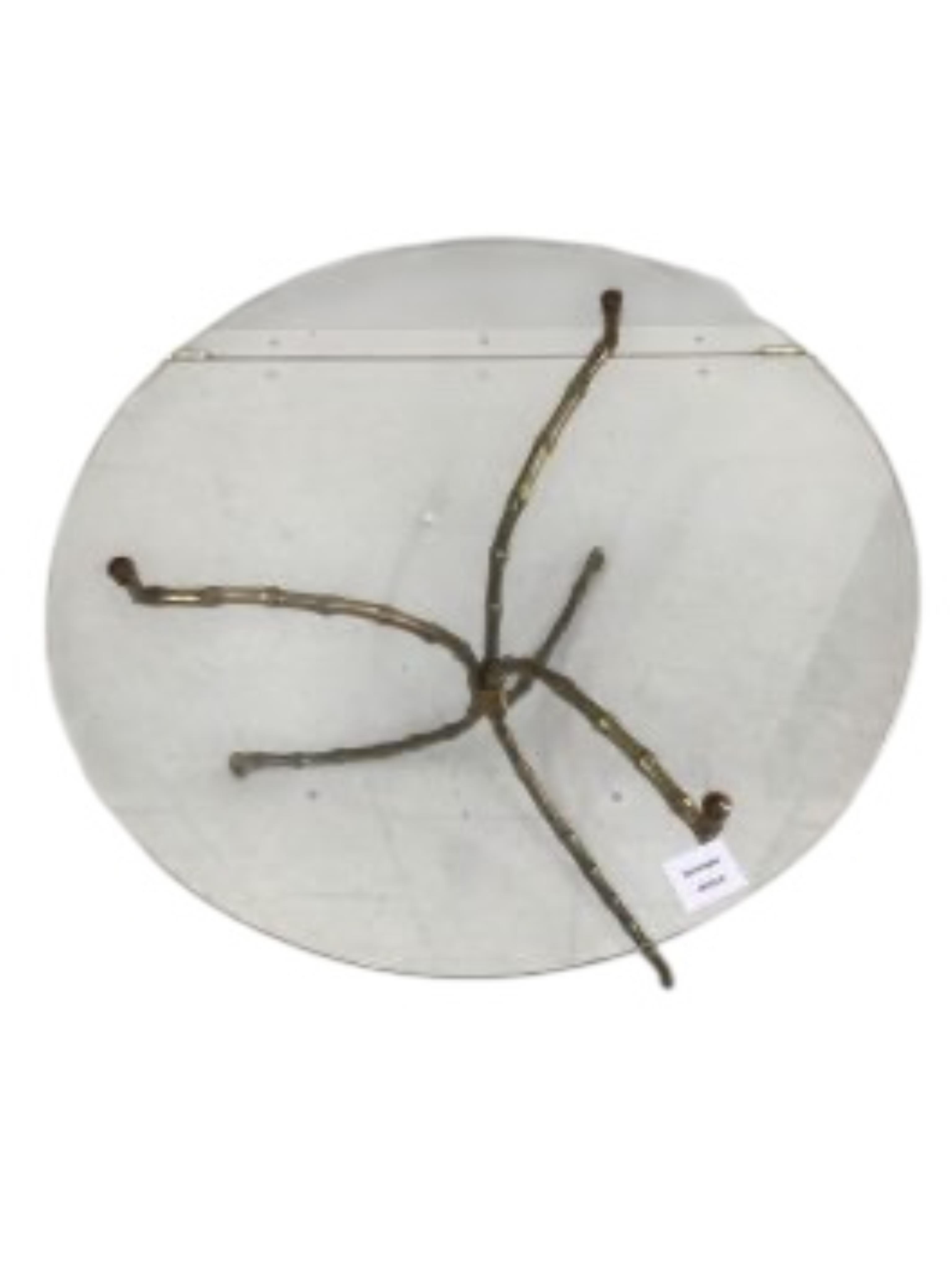 A Maison Jansen style circular glass top coffee table with faux bamboo tripod base, diameter 60cm, height 43cm